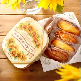 フランスでも愛されている「ひまわり」のブーケが華やかに描かれた夏限定パッケージの焼き菓子詰め合わせ。